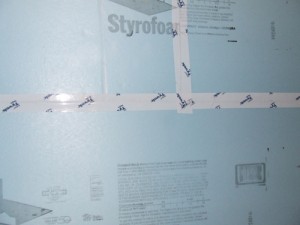 Tyvek tape on blue board.