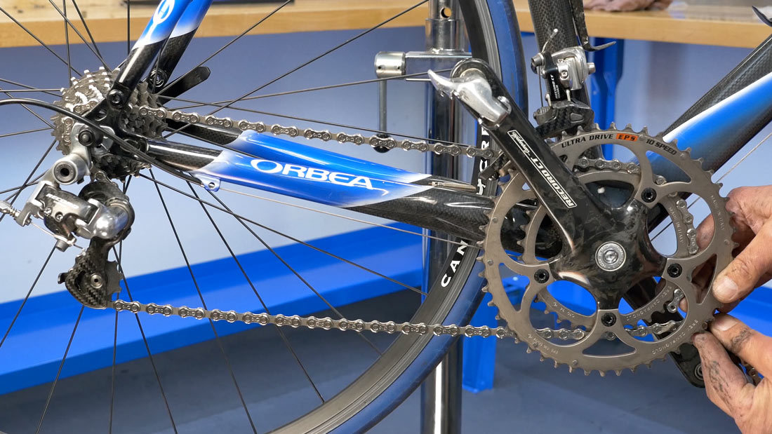 Pull rear rear derailleur until perpendicular